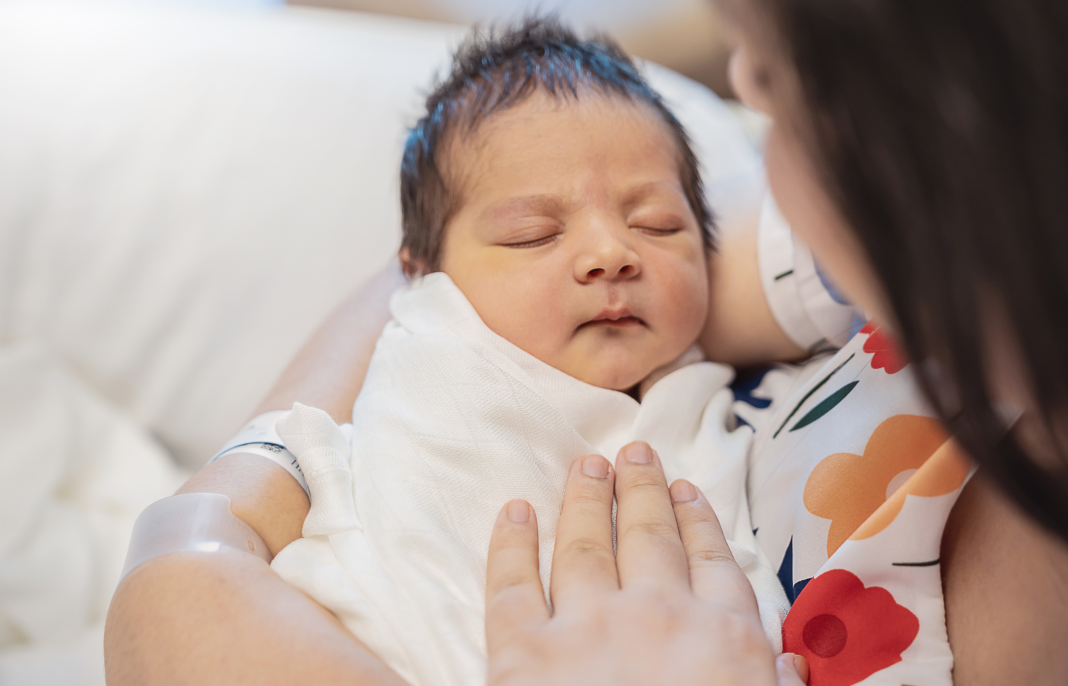 Closeup portrait of young asian Indian mother holding newborn baby with copy space. Healthcare and medical daycare nursery love lifestyle together single mom motherâs day holiday concept Baby and Mother at Hospital